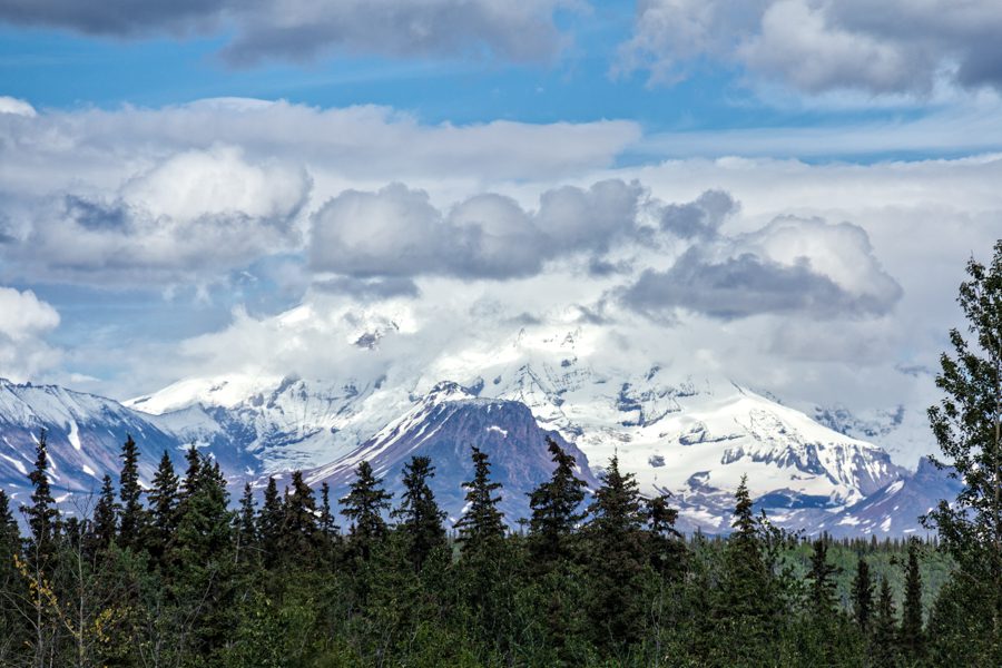 I particularly like the puffy clouds in this photograph of Mt. Drum.